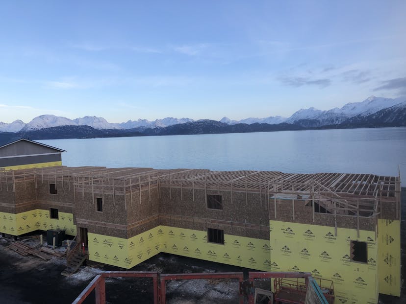 Land's End construction with a beautiful winter view of Kachemak Bay.